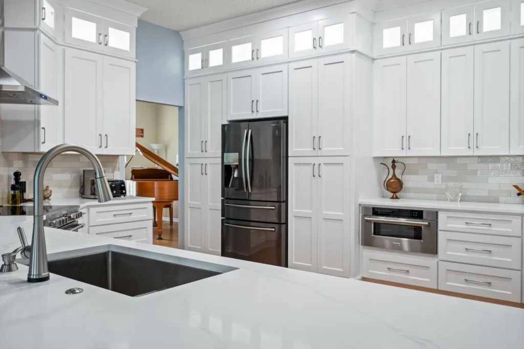 Bright white surfaces in a Greystone kitchen remodel in Jacksonville
