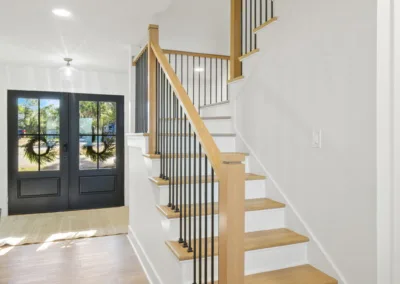 Oak Tread Staircase project, home renovation by Greystone Kitchens in Jacksonville, FL, photo 2 of 2