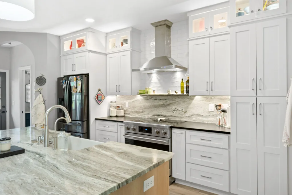 Veined island in a Greystone kitchen remodel in Jacksonville