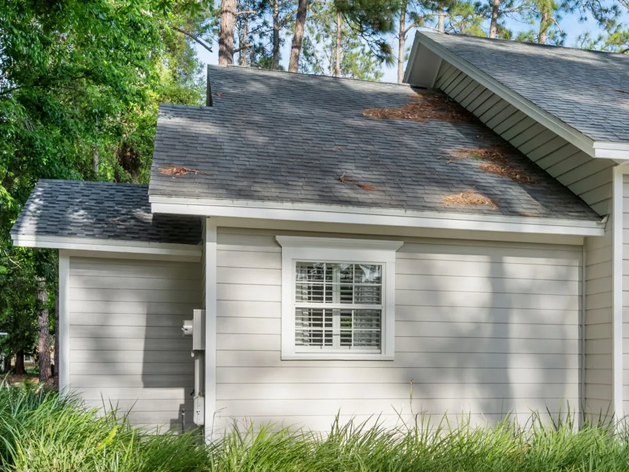 After: a new gabled closet bump-out with matched siding and roofline